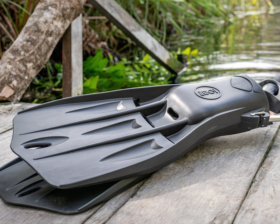 Fourth Element Tech Fins in black on a dive side entry