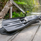 Fourth Element Tech Fins in black on a dive side entry 