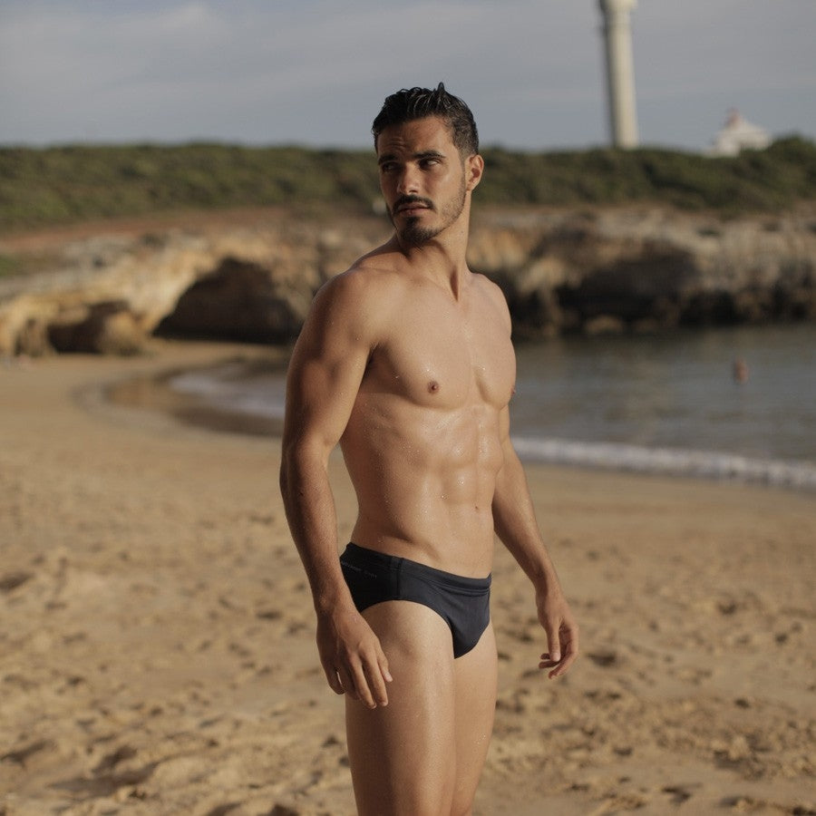 Men wearign teh TIma Swim trunk from Fourth Element 